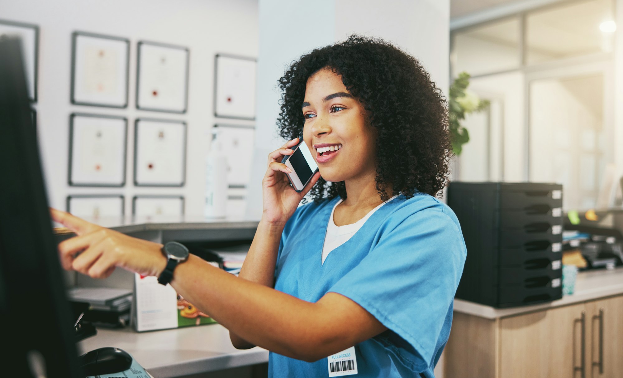 Phone call, nurse and black woman with computer in hospital for healthcare or telehealth. Medical,